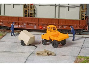 nakladač Waran 1500 s kompresorovým přívěsem Auhagen 43698